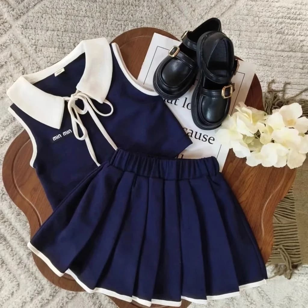 Bộ Đồ Bé Gái 2026 Phong Cách Mới Preppy Phong Cách Ve Áo Không Tay Top Bé Gái Thời Trang Xếp Ly Váy Hai Mảnh Phù Hợp Với