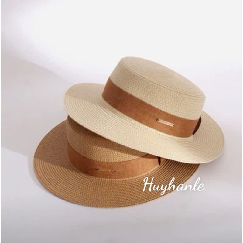 Mũ/nón đầu bằng đai nâu, gắn khuy đồng, bao chất dầy