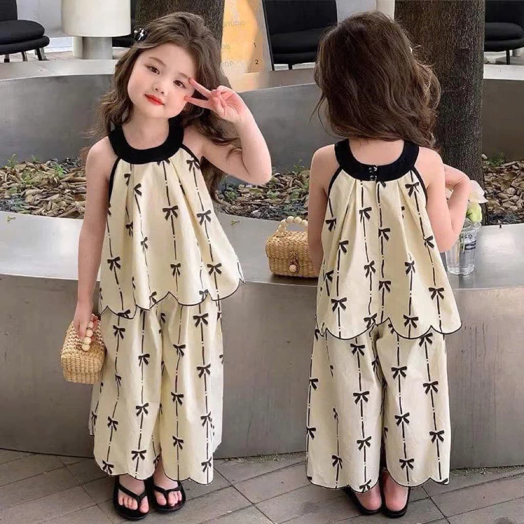 [Mới Về ] U2 Set áo cổ yếm kèm quần xuông bo viền hoạ tiết nơ xinh xắn cho bé diện đi chơi ,đi học ,du lịch (9-35kg)