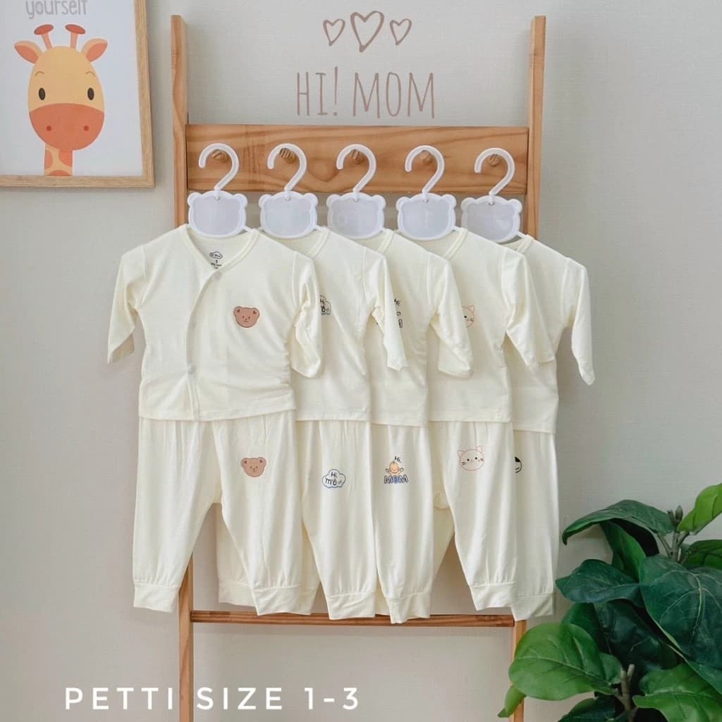 Bộ dài tay Peptit nền vàng kem cúc lệch phong cách Hàn Quốc cho bé size 3-9kg