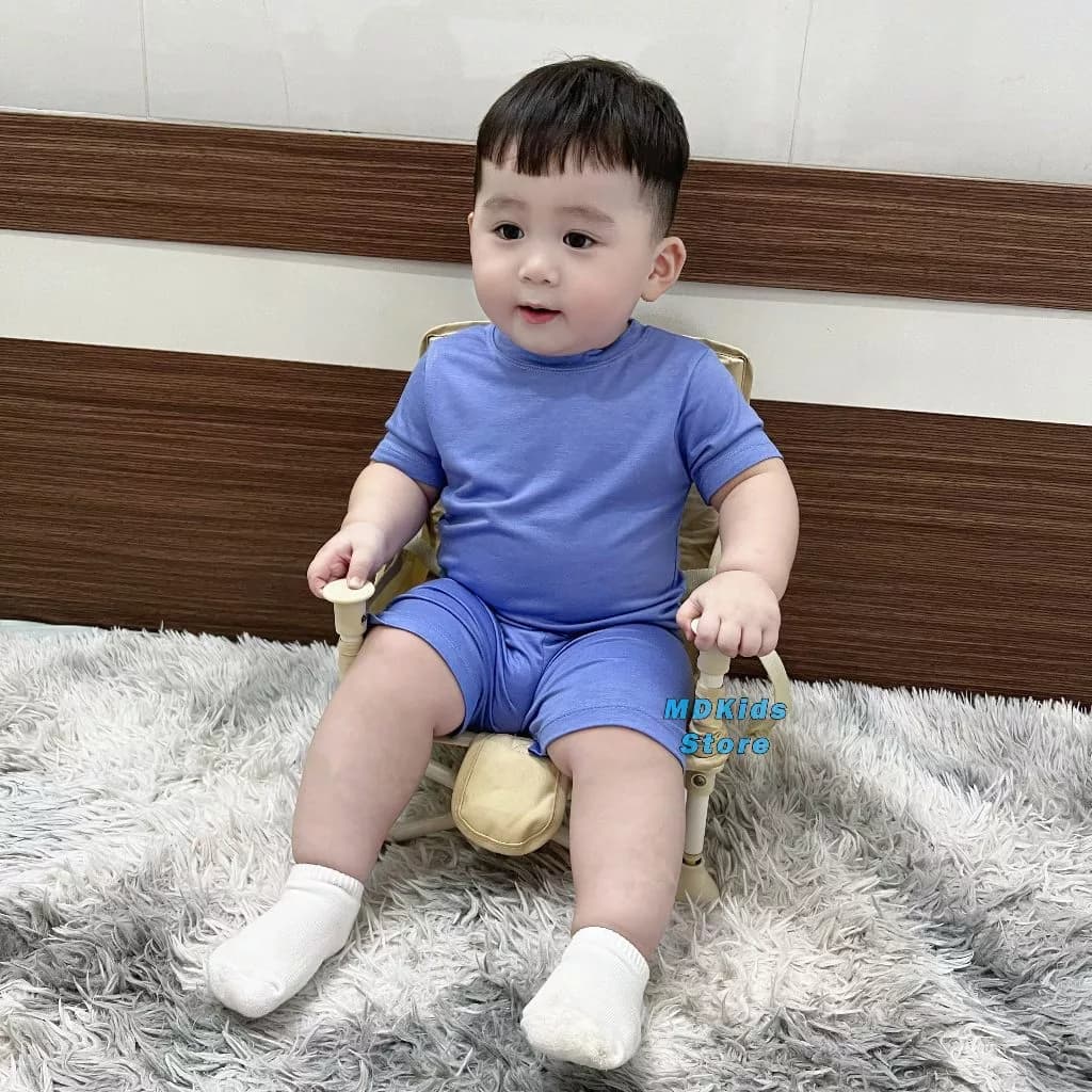 Bộ quần áo cộc tay thun lạnh GOLD KIDS cho bé trai và bé gái 5-15kg.