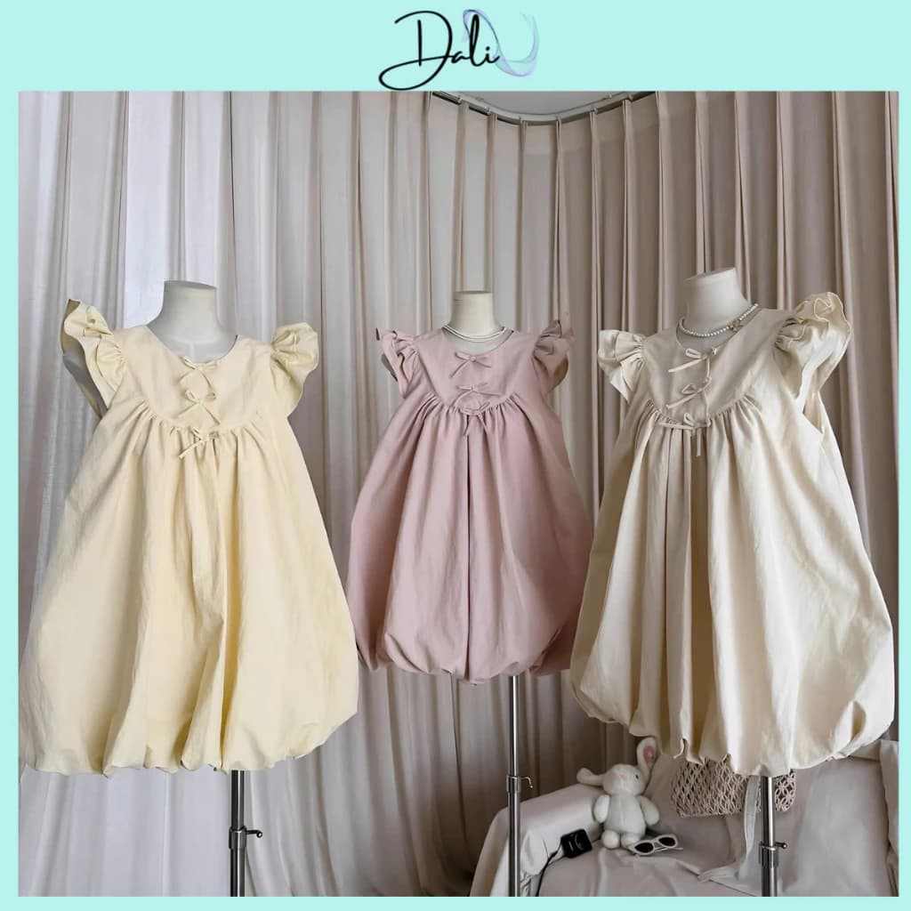Váy Bí Phồng Sát Nách Dáng Babydoll Đính Nơ Nhỏ Chất Liệu Thô Gió Hàn